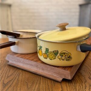 Vintage kitchen pots. Cera-met enamel mustard cooking pot. Retro Merry mushroom